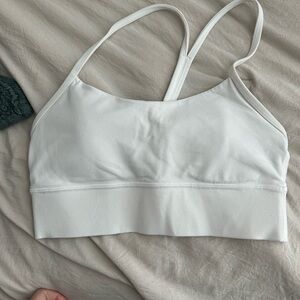White Sports Bra with Adjustable Straps and Wide Elastic Band